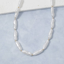 Pearlescent Barrel Bead And Gold Station Necklace