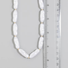 Pearlescent Barrel Bead And Gold Station Necklace